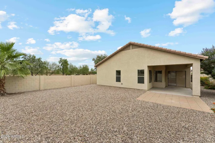 Large corner lot with extended patio. The backyard is a blank slate to design your special retreat!