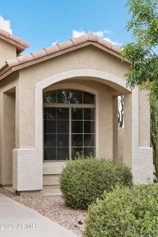 Welcome Home to a cute front porch area.