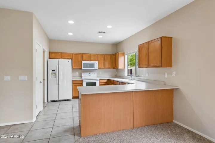 Kitchen with breakfast bar.