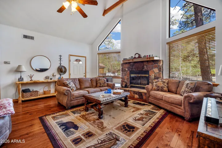 Lower level wood floors, vaulted ceilings with large windows for natural lighting