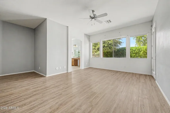 DOUBLE SIZED Primary Suite with it's own exit to back yard