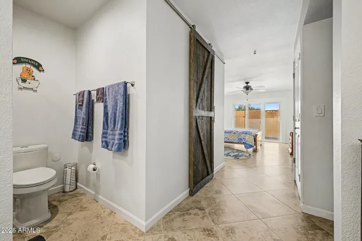 PRIMARY BATH + BARN DOOR CLOSET