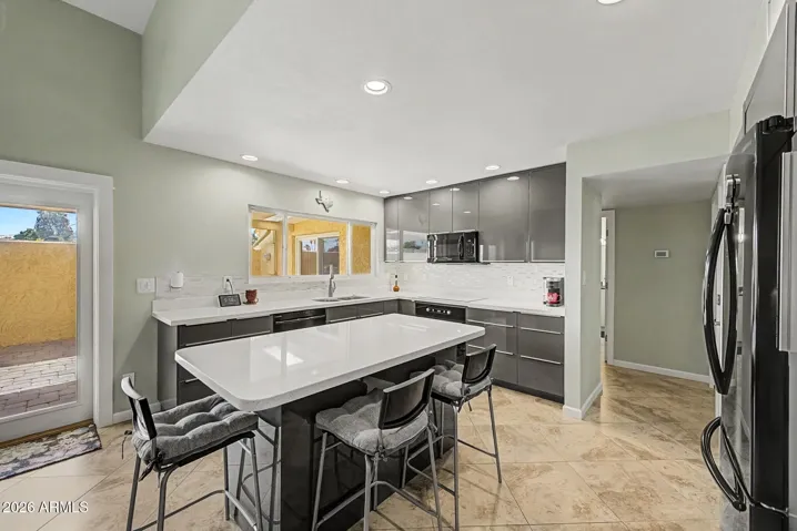OPEN + REMODELED KITCHEN + BREAKFAST BAR