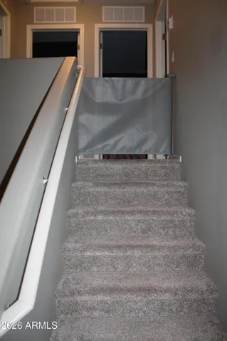 Retractable Safety Gate at Top of Stairs