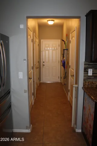 Kitchen To Garage, Pantry, Laundry, Powder Room, and Storage