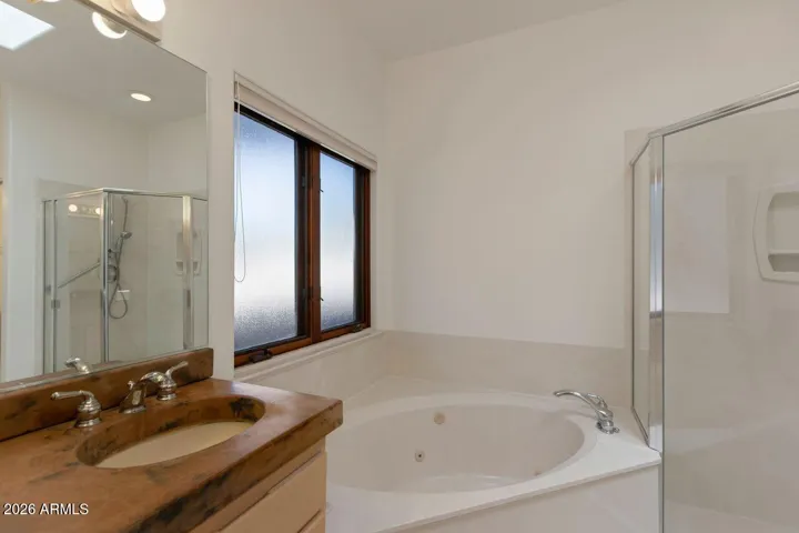 Double sinks with separate jetted tub and shower