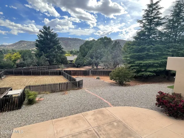 Backyard with fenced in dog run