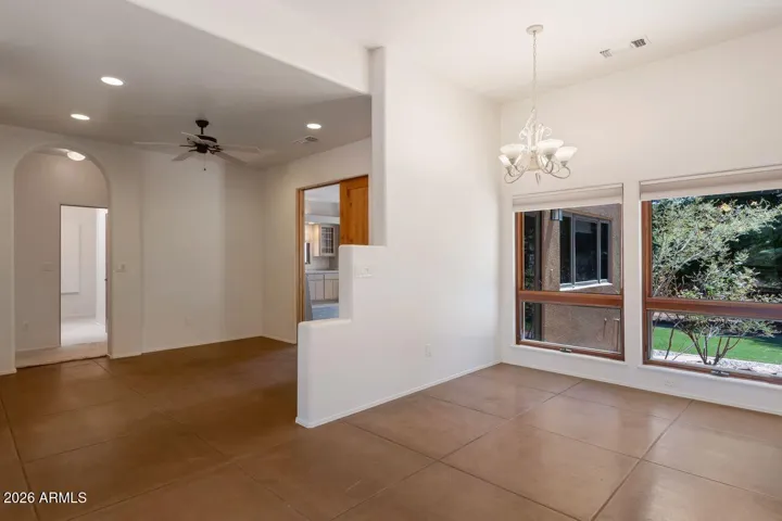Formal dining room off kitchen with outside access adjacent to sitting area