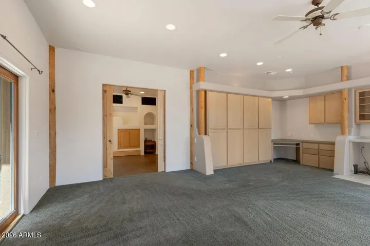 Build-in cabinets, office area and wet bar