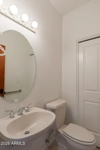 Powder room off living room area. Linen closet plumbed for shower.