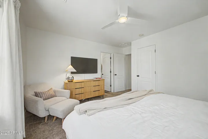 Primary suite with two walk in closets