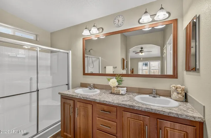 Dual sinks and glass door shower!
