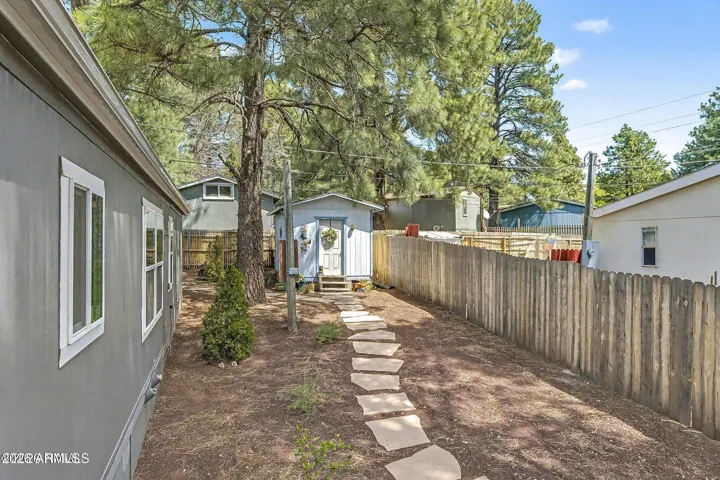 Flagstone path to storage shed.