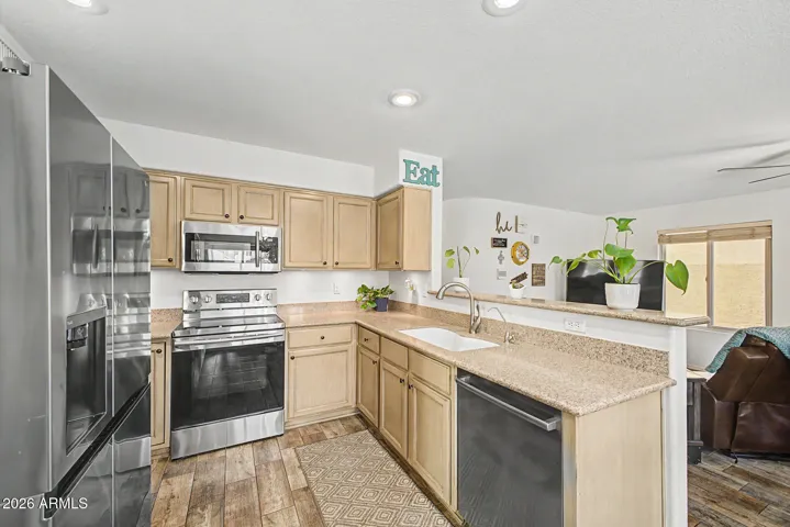 Kitchen offers ample counter and cabinet space