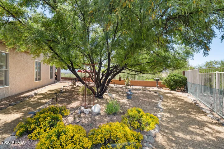 A tranquil, intentionally designed space with mature trees, soft pathways, and a quiet sense of balance that invites you to slow down and breathe.