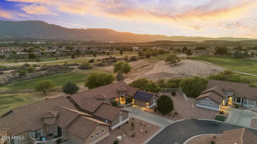 As a coveted end unit, the home enjoys an oversized side yard, added privacy, and a rare feeling of openness that’s hard to find within the community.