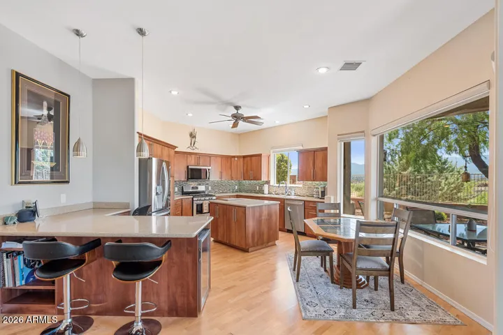 A thoughtfully integrated workspace just off the kitchen offers a quiet place to focus—connected, yet tucked away.
