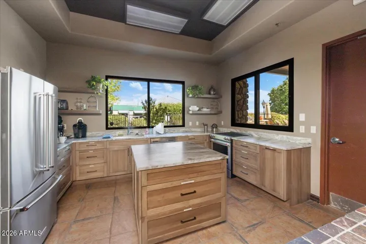 Clubhouse membership includes access to a beautifully appointed entertainment kitchen, perfect for hosting, gathering, and enjoying shared moments with ease.
