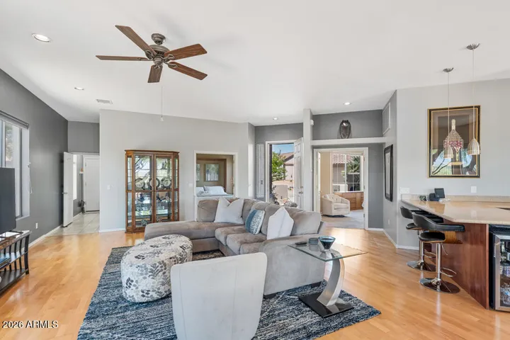 The front door opens to a bright, airy living space where generous proportions and an easy flow create an immediate sense of comfort.