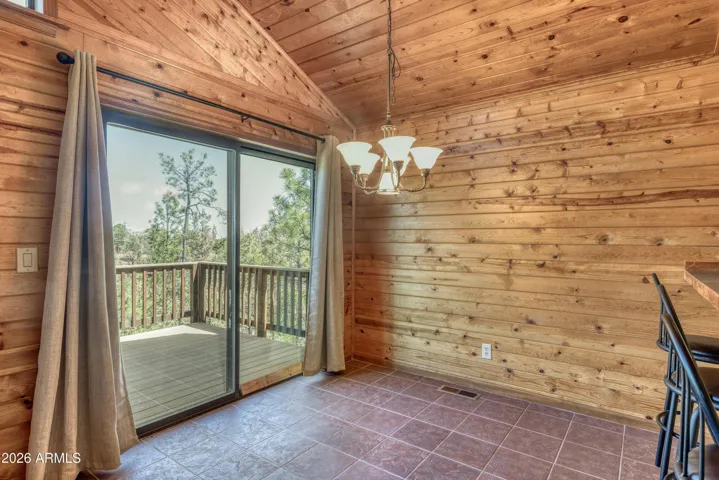Dining area with Trex Deck balcony.