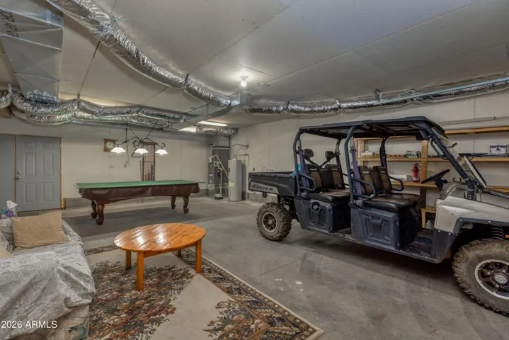 Inside of garage, doubles as a Game Room complete with pool table. Polaris side by side does NOT convey