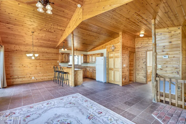 Vaulted Ceilings with Knotty Pine tongue and groove walls & ceilings throughout.