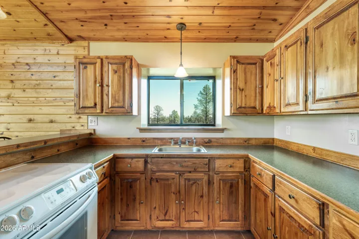 Kitchen with views out the window.