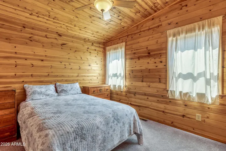 Bedroom with carpet.