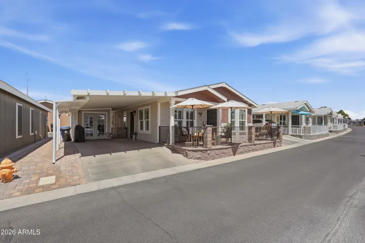 Front & Back Covered patios in this South facing home