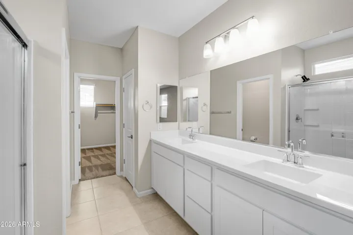 OWNER'S PRIVATE EN-SUITE - DUAL SINKS - LOOKING TOWARDS CLOSET