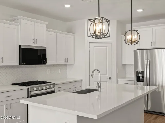 Photo is not of the actual home. Interior finishes and fixtures may vary.