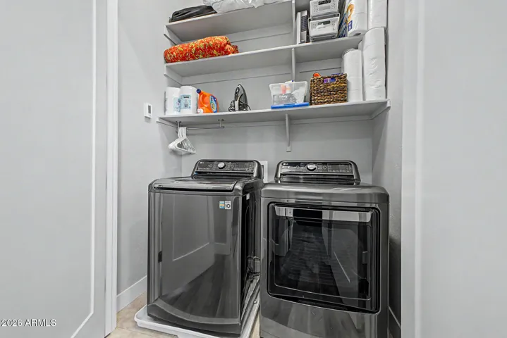 Laundry room with extra shelving