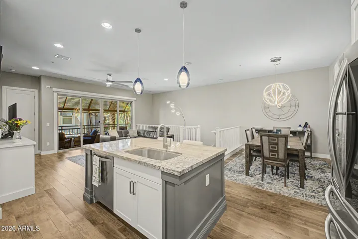 View from kitchen to the Living Room and balcony