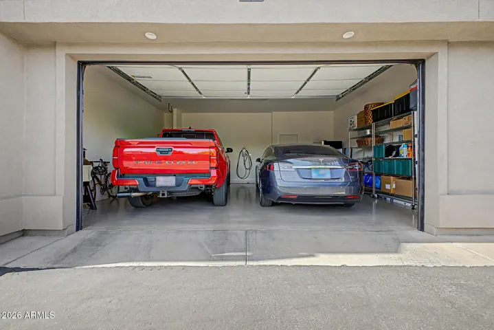 Roomy garage with two vehicles