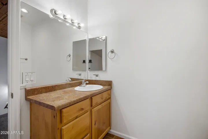 Secondary bathroom with new faucet and angle stops