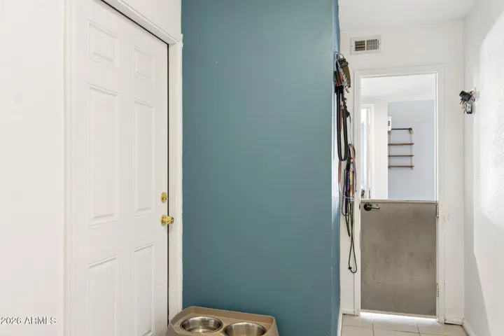 With access to garage. Could be a pantry?