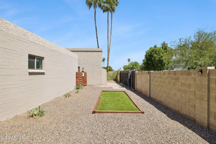 Side yard is separated so guests have private space.