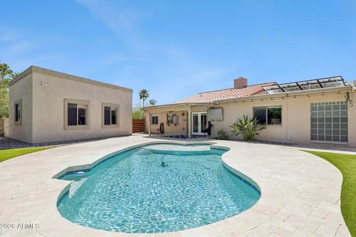 2022 - fully remodeled pool with travertine decking