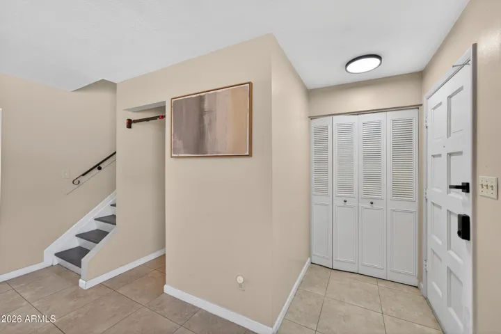 Front Door Entry way with a storage closet