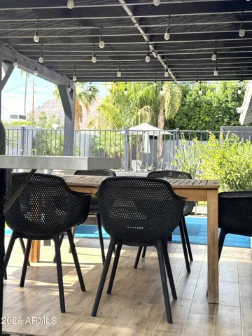 View from patio dining to pool and veiws of Camelback mountain