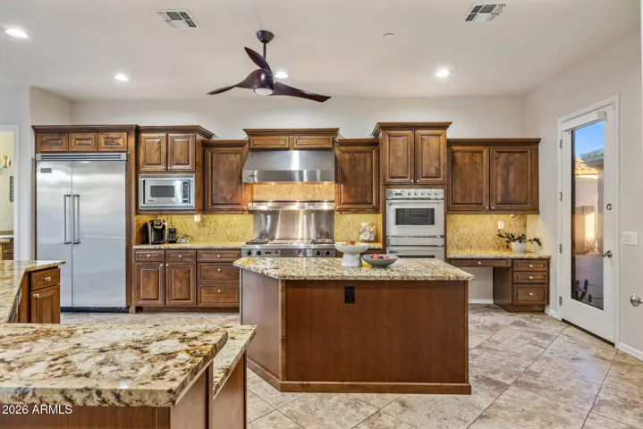 Commercial grade appliances are just a few features you will love about this home.