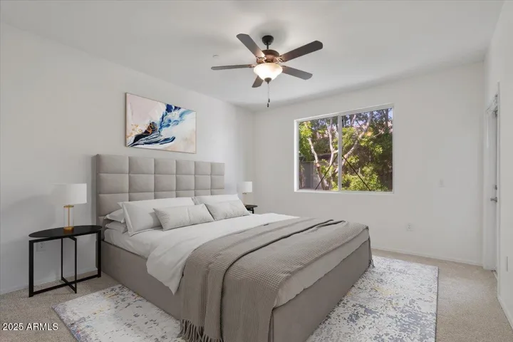 Primary Bedroom w/ Balcony Access *virtually staged*
