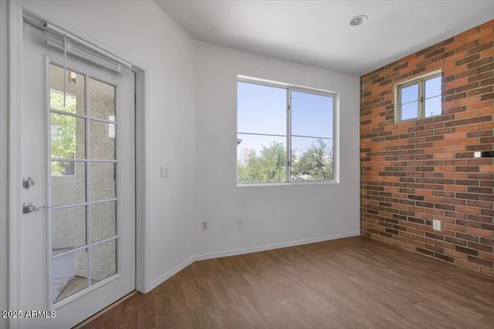 Dining Area w/ Balcony Access