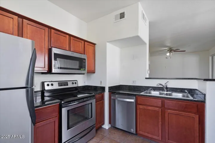 Kitchen adjacent to Living Area - refrigerator included