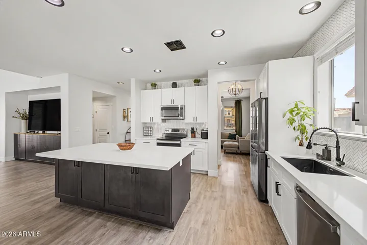 Beautiful center island with extra cabinet space, breakfast bar.