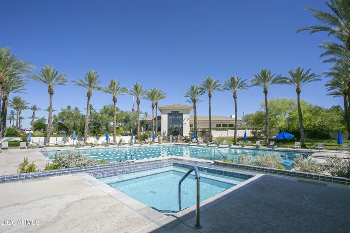 An amazing pool featuring lap lanes, a relaxing soaking area, a hot tub, ramadas, and BBQs!