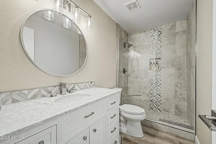 guest bathroom with walk in shower