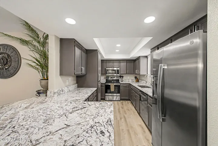stainless steel appliances and granite countertops