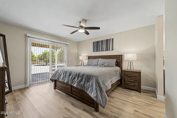 primary suite with private access to back patio