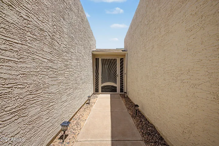entrance with wrought iron security door